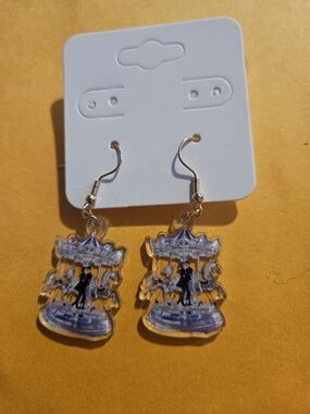 Clear Carousel Dangle Earrings with Blue Accents